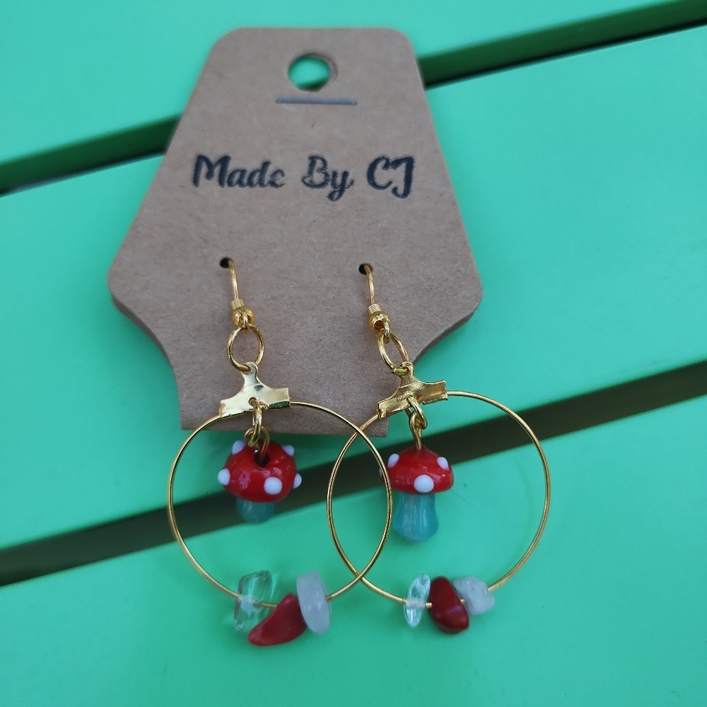 Gold tone glass mushroom and gemstones. Quartz, Rose Quartz and red stone